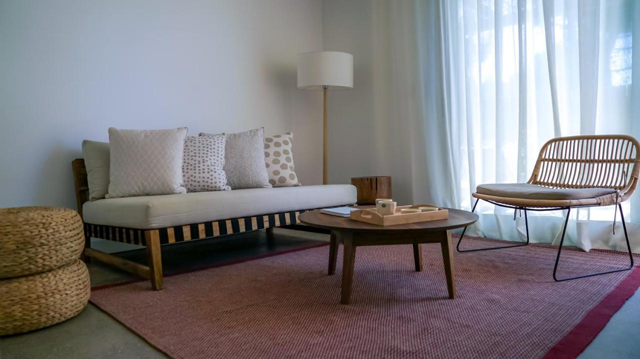 Casagrande Hotel&Beach Club José Ignacio Buitenkant foto A living room with a carpet