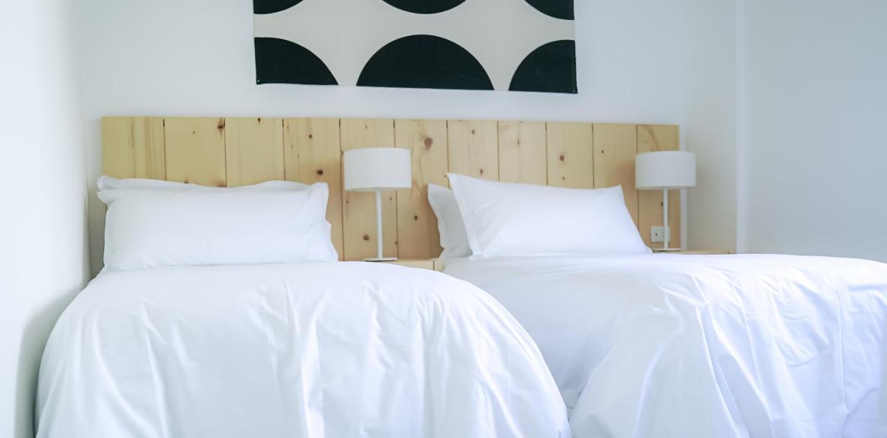 Casagrande Hotel&Beach Club José Ignacio Buitenkant foto A bed with white sheets