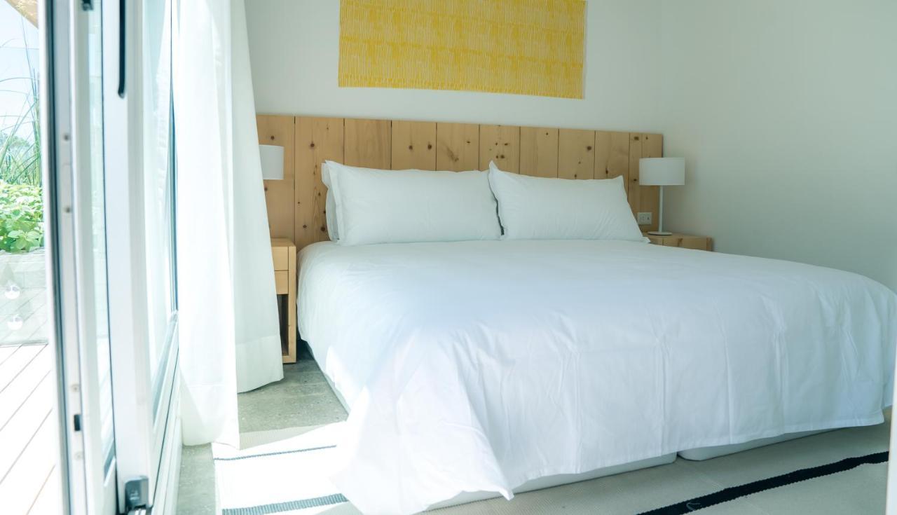 Casagrande Hotel&Beach Club José Ignacio Buitenkant foto A bedroom at the hotel